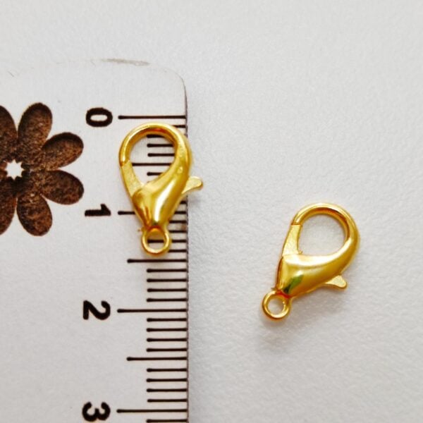 Fecho mosquetão15 mm em metal cor dourado