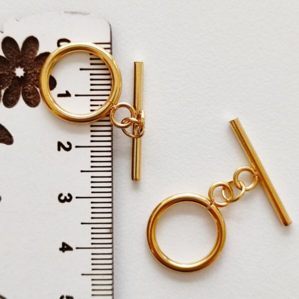 Fechos terminais "T" em aço inoxidável dourado 16 mm