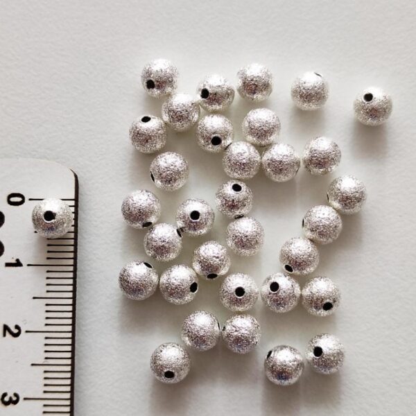 contas em metal 6 mm- prateado