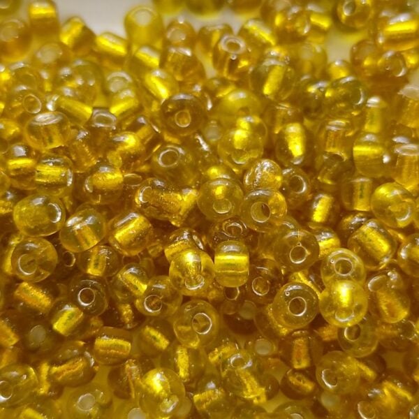 Missangas 3mm irregular furo de 1mm - cor AMARELO 30gr