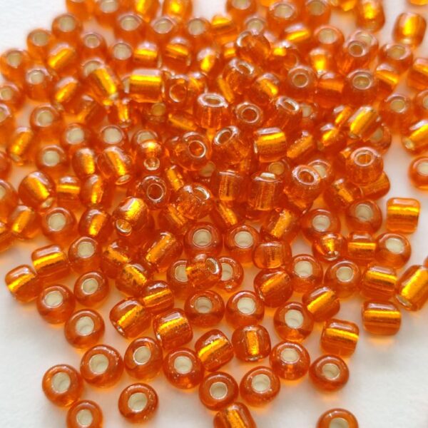 Missangas 3mm irregular furo de 1mm - cor LARANJA 30gr