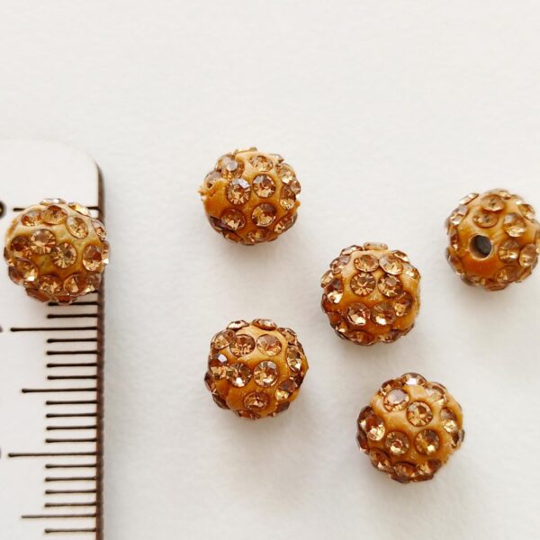 Contas em pele com strass 8 mm- Dourado