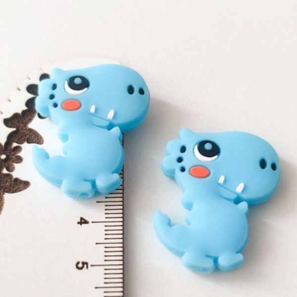 Conta em silicone dinossauro 35mm- Azul -para prende chucha