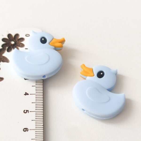 Conta em silicone pato 30mm- Azul claro para prende chucha