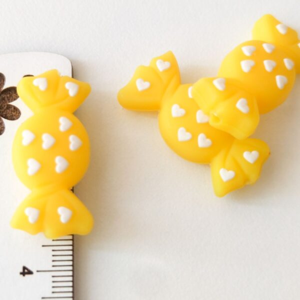 Conta em silicone -Laço-Amarelo -35mm- para prende chucha