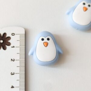 Conta em silicone -Pinguim-Azul claro-25mm- para prende chucha