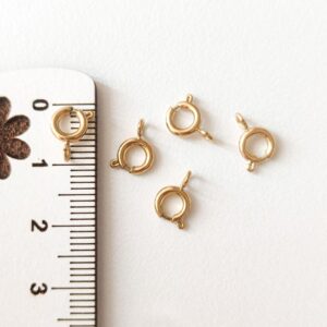 Mosquetão em aço inoxidável 6 mm- dourado