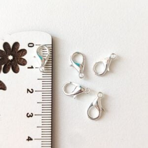 Fecho mosquetão 12 mm em metal cor prateado claro