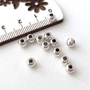 Separador em metal prateado 4mm-furo 2mm