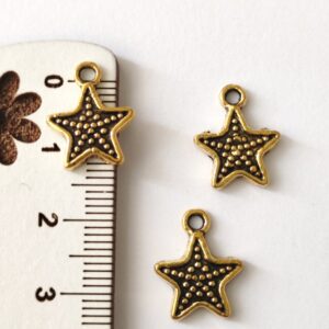 Pendente metálico estrela -13 mm dourado