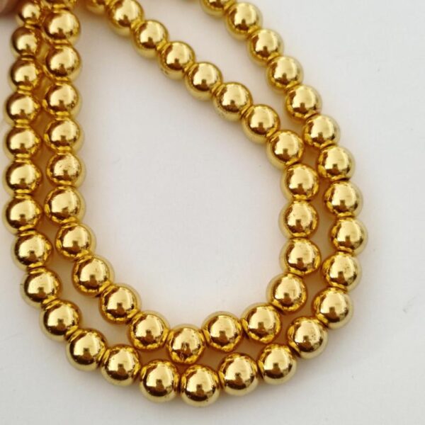 Fiada de contas em hematite 6 mm-dourado
