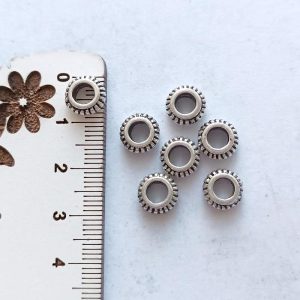 Separador em metal 9 mm prateado/furo 5 mm