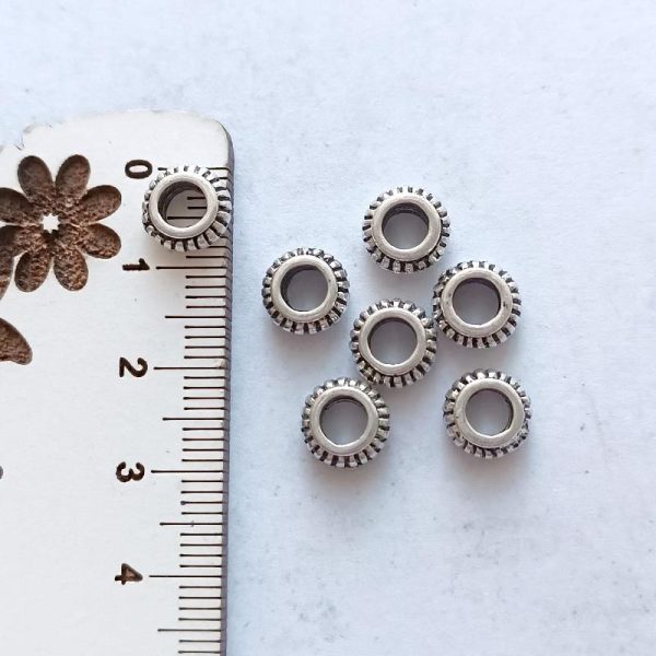 Separador em metal 9 mm prateado/furo 5 mm