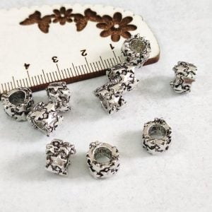 Separador em metal 9 mm prateado/furo 5 mm
