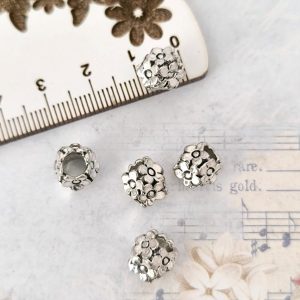 Separador em metal 10 mm prateado/furo 5 mm